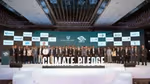 Group picture at the signing of Climate Pledge